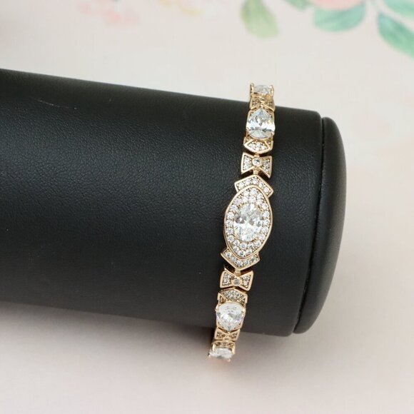 "Elegant Oval-Cut Crystal Rose Gold Bracelet with Bow Accents, XPBL0800 - Picture 9 of 11